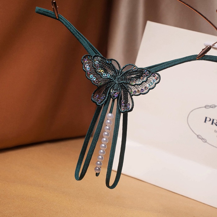 NA012 จีสตริงผีเสื้อร้อยมุกสุดเซ็กซี่ จีสตริงเปิดเป้าเป็นสายยางยืดด้านหน้าแต่งผีเสื้อช่วงล่างเปิดเป้ามีสายร้อยมุกผ่ากลางตามรูป