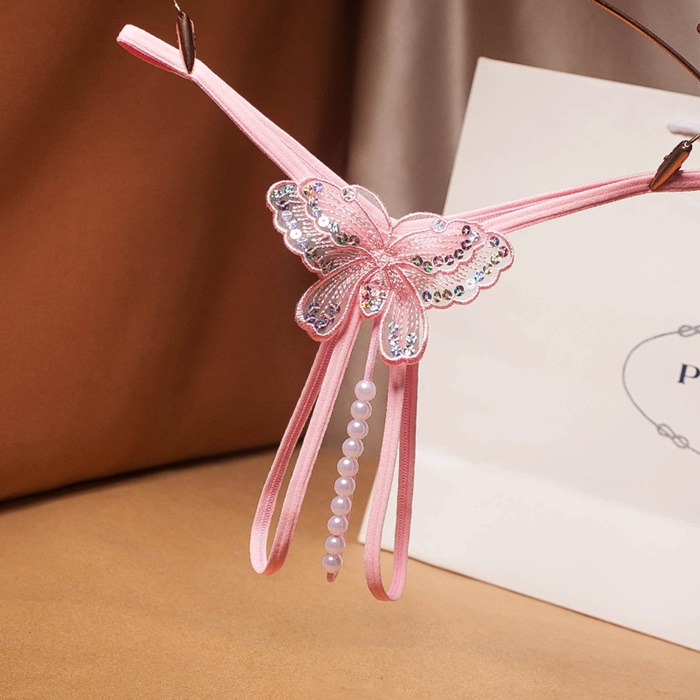 NA012 จีสตริงผีเสื้อร้อยมุกสุดเซ็กซี่ จีสตริงเปิดเป้าเป็นสายยางยืดด้านหน้าแต่งผีเสื้อช่วงล่างเปิดเป้ามีสายร้อยมุกผ่ากลางตามรูป