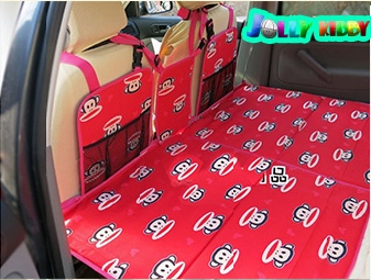 แผ่นปูปิดช่องวางเท้าเบาะหลังรถ กันเด็กตก Paul Frank ลาย CK ขนาด 134 x 75 cm A10104