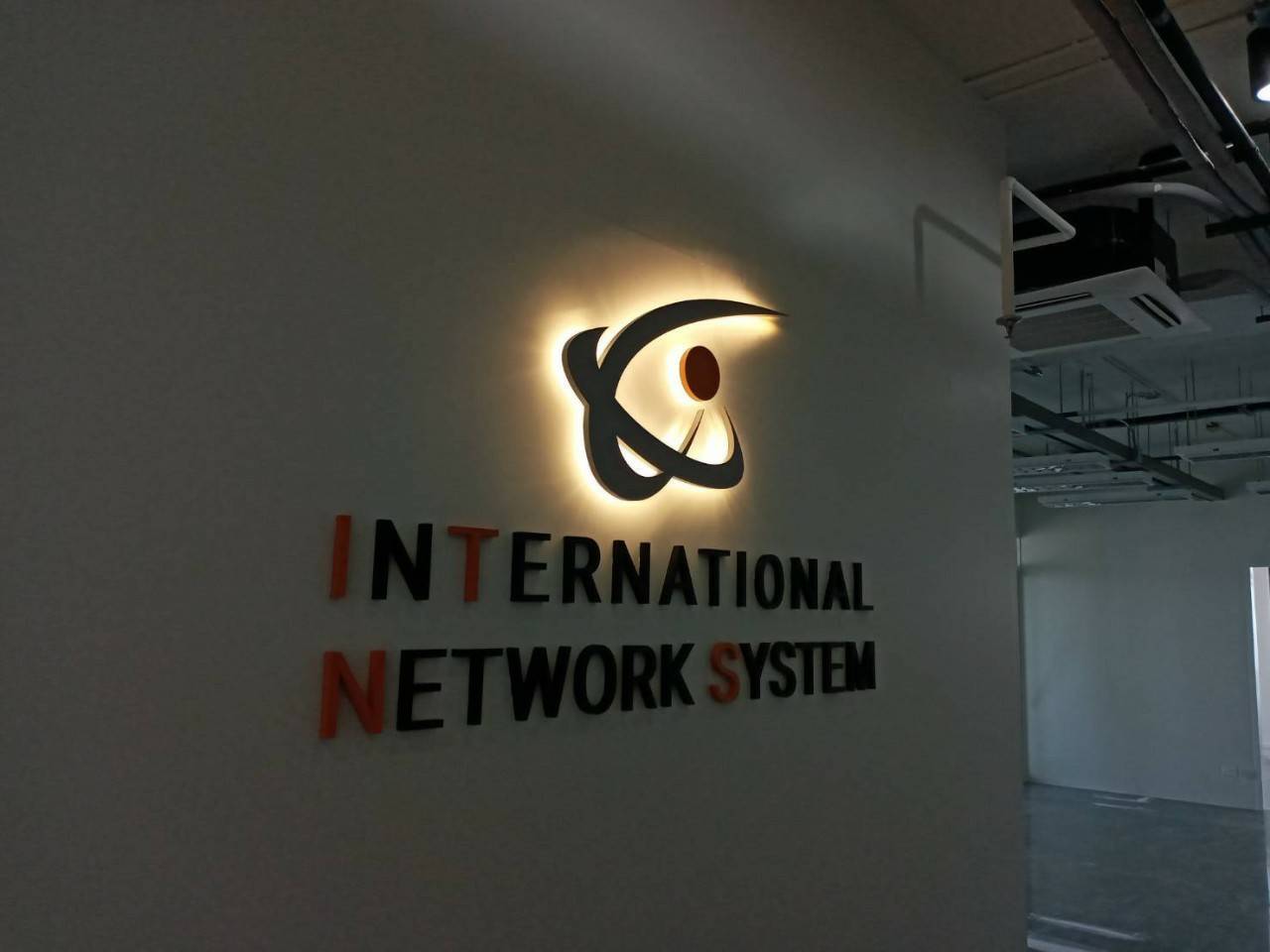 ป้ายไฟออกหลัง - INTERNATIONAL NETWORK SYSTEM