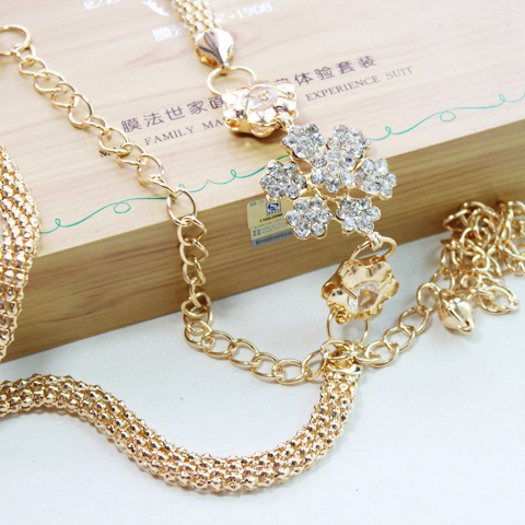 เข็มขัดออกงานสีทอง หัวเข็มขัดดอกไม้ประดับเพชร ส่งฟรี ems