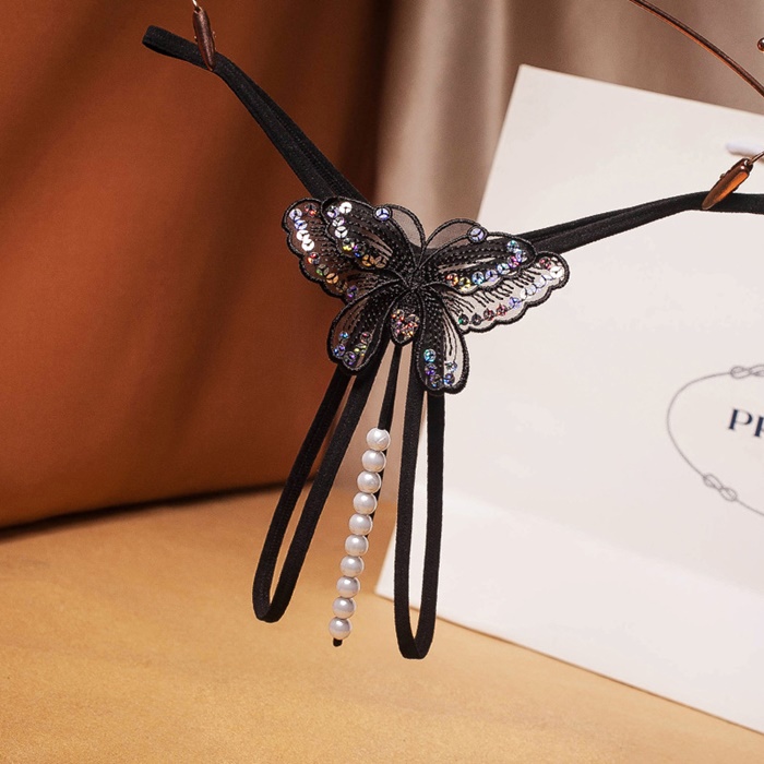 NA012 จีสตริงผีเสื้อร้อยมุกสุดเซ็กซี่ จีสตริงเปิดเป้าเป็นสายยางยืดด้านหน้าแต่งผีเสื้อช่วงล่างเปิดเป้ามีสายร้อยมุกผ่ากลางตามรูป