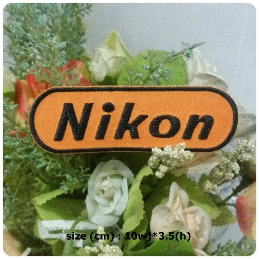 โลโก้ Nikon ตัวรีดติดเสื้อ อาร์มรีด อาร์มปัก ตกแต่งเสื้อผ้า หมวก กระเป๋า แจ๊คเก็ตยีนส์ Hipster Embroidered Iron on Patch