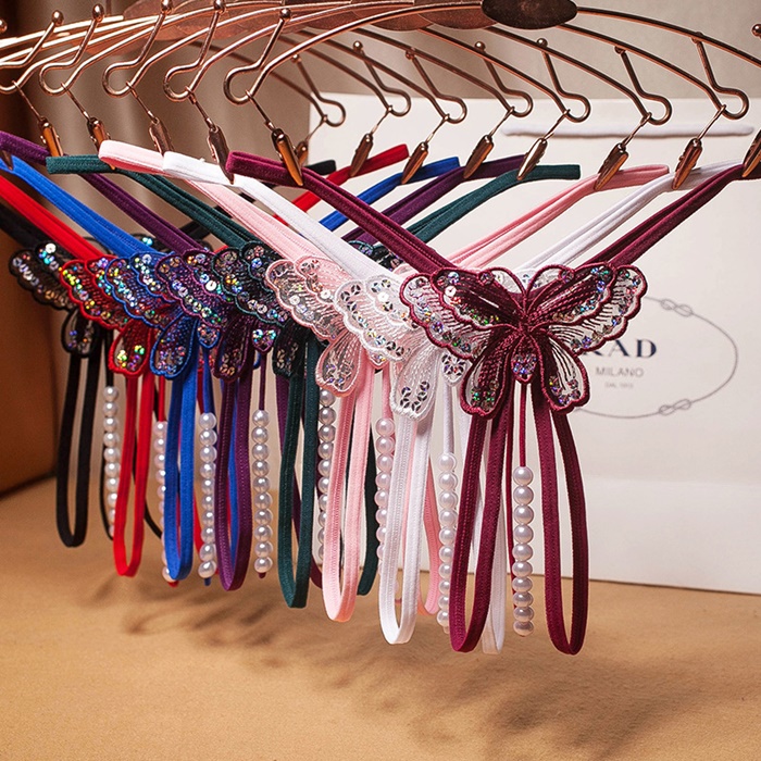 NA012 จีสตริงผีเสื้อร้อยมุกสุดเซ็กซี่ จีสตริงเปิดเป้าเป็นสายยางยืดด้านหน้าแต่งผีเสื้อช่วงล่างเปิดเป้ามีสายร้อยมุกผ่ากลางตามรูป