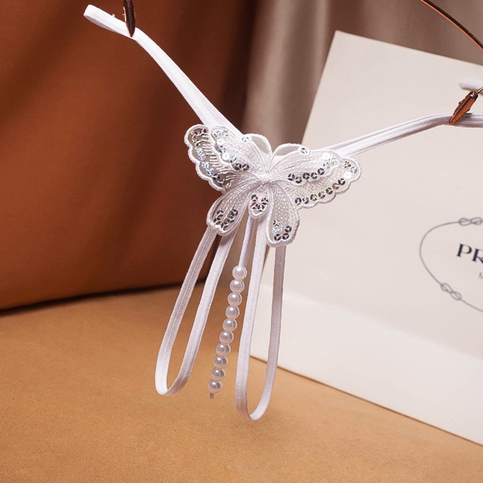 NA012 จีสตริงผีเสื้อร้อยมุกสุดเซ็กซี่ จีสตริงเปิดเป้าเป็นสายยางยืดด้านหน้าแต่งผีเสื้อช่วงล่างเปิดเป้ามีสายร้อยมุกผ่ากลางตามรูป