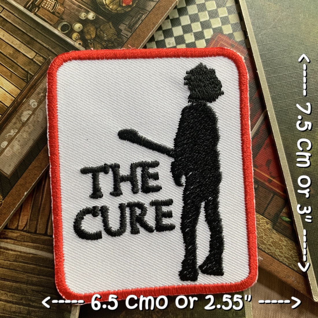 The Cure วงดนตรี ร็อค เฮฟวี่เมทัล พังค์ ตัวรีดแบบปัก อาร์มปัก ตัวรีดติดเสื้อ ตัวรีด ติดกระเป๋า ติดหมวก ติดแจ๊คเก็ต Rock Iron on Embroidered Patch