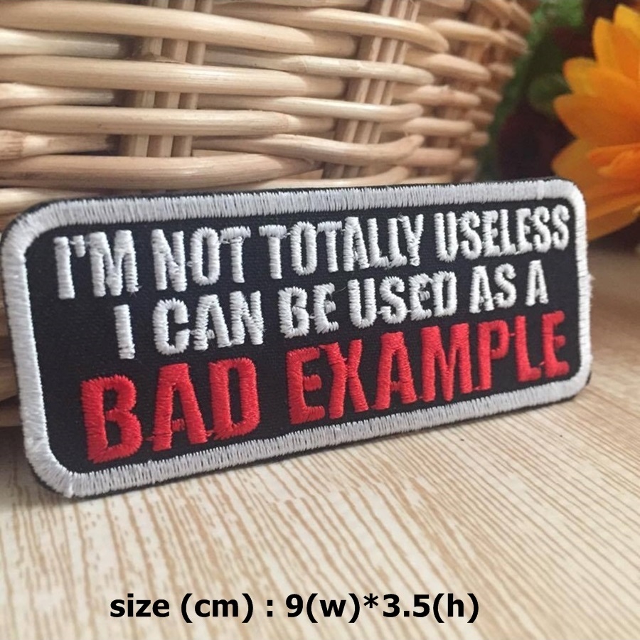 I'm not totally Useless ตัวรีดติดเสื้อ อาร์มรีด อาร์มปัก ตกแต่งเสื้อผ้า หมวก กระเป๋า แจ๊คเก็ตยีนส์ Quote Embroidered Iron on Patch