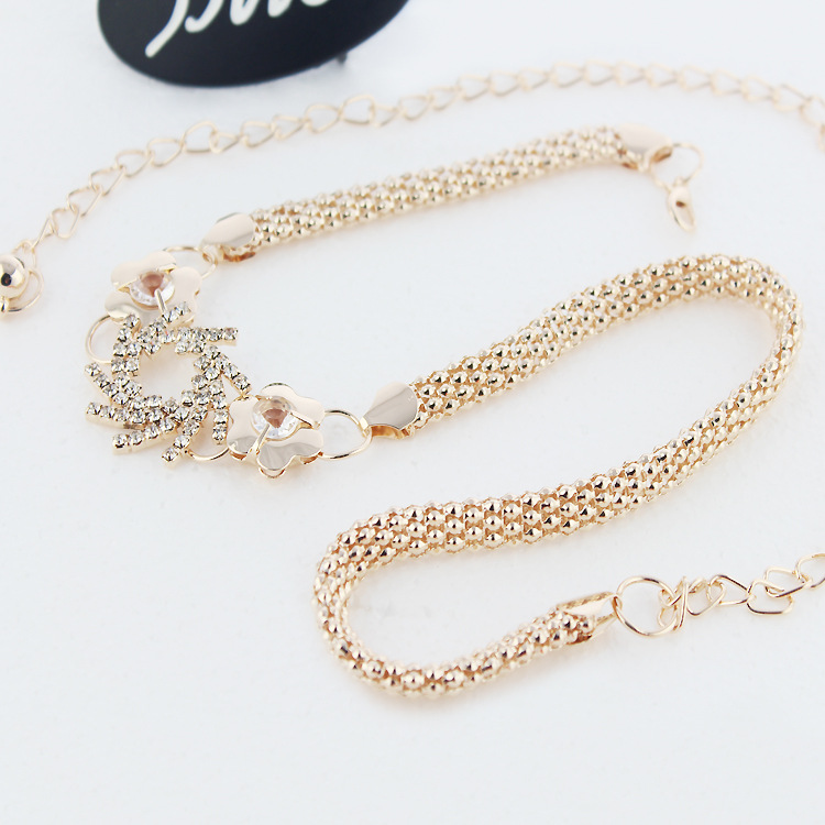 เข็มขัดออกงานสีทอง หัวเข็มขัดวงกลมเกลียวประดับเพชร ส่งฟรี ems