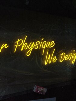 ป้ายไฟนีออนดัด แสงสีเหลือง Your phgsique We Design #วางบนอะคริลิคใสไดคัทรองหลัง