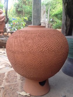 โอ่งดินน้ำล้น